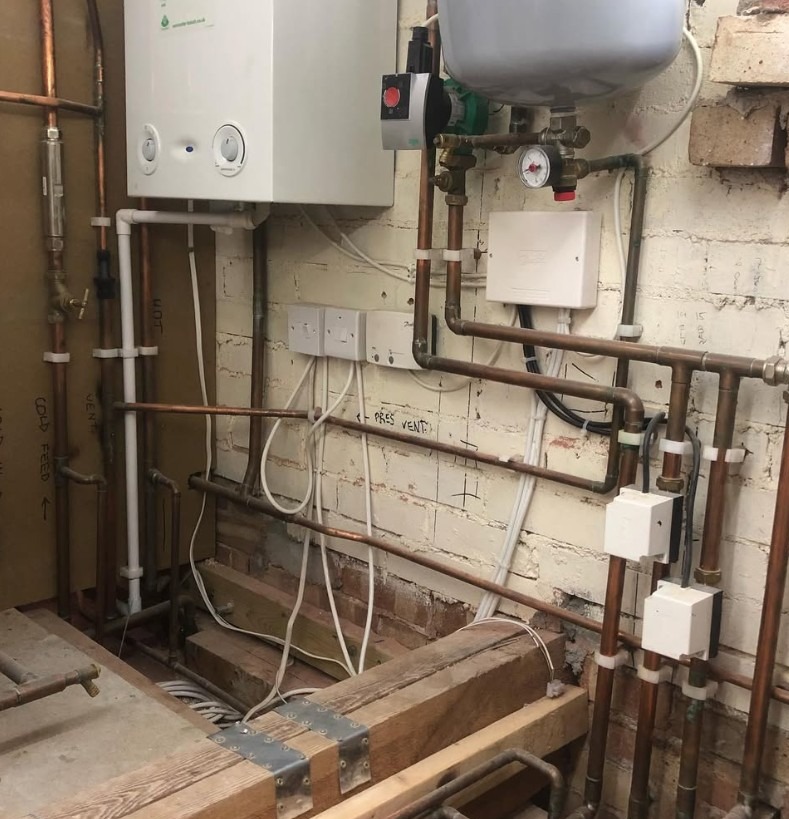 New gas boiler installation completed with copper pipework, pump and heating controls